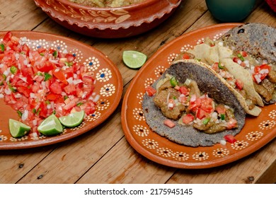 Chicharrones In A Green Sauce Tacos Served With Pico De Gallo Salad. Typical Mexican Food.