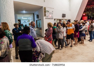 CHICHEN ITZA, MEXICO - FEB 25, 2016: Tourists Wait In A Queue For A Light Show At Chichen Itza Ruins.
