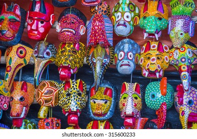 CHICHICASTENANGO , GUATEMALA - JULY 26 : Mayan wooden masks for sale at Chichicastenango market in Guatemala on July 26 2015. This native market is the most colorful in Central America