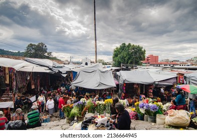 Chichicastenango, Quiché, Guatemala; March 17th 2022: The most popular and crowded grand artisan market of chichicastenango being visited by tourist and guatemalan people on holydays.