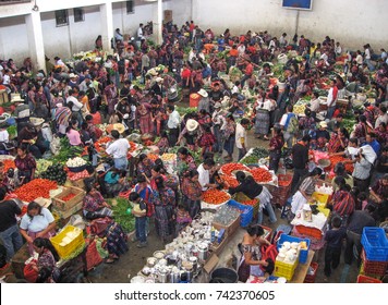 CHICHICASTENANGO, GUATEMALA-MAY 14, 2007: The busy produce market in  draws buyers and sellers within the local area each Thursday and Sunday-the largest market in Central America.