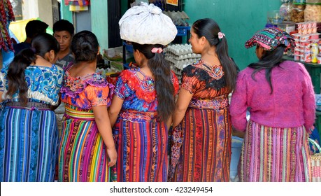 CHICHICASTENANGO GUSTEMALA APRIL 29 2016: Portrait of a colored dress Mayan women. The Mayan people still make up a majority of the population in Guatemala,