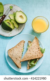Chicken and avocado wholegrain bread sandwich triangles