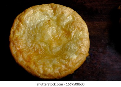 Chicken Or Beef Pot Pie With Golden Pastry. Isolated On Black Background. Top View With Copy Space