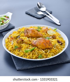 Chicken Biryani, spicy, delicious and mouth-watering rice meal with juicy and tender chicken