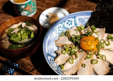 Chicken breast cooked at low temperature.Japanese donburi style.with the nori(seaweed) and  a york. - Shutterstock ID 2282595469