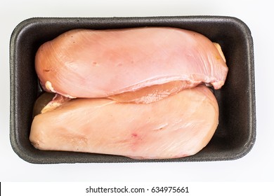 Chicken Breast Fillets Raw In Food Packaging Tray. Studio Photo