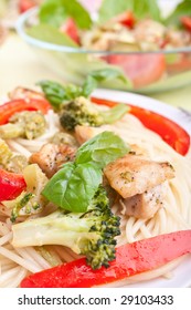 Chicken And Broccoli Pasta Dijon With Bowl Of Salad At The Back