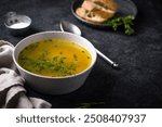 Chicken broth with parsley, healthy food