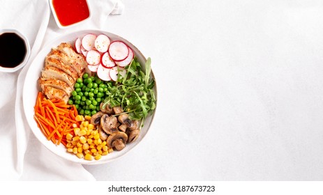 Chicken Buddha Bowl With Meat, Colorful Vegetables On Base Of Brown Rice.