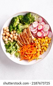 Chicken Buddha Bowl With Meat, Colorful Vegetables On Base Of Brown Rice.