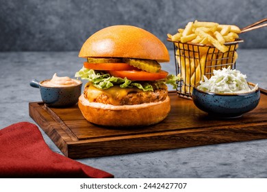 CHICKEN BURGER WITH FRIES AND COLSLAW SALAD - Powered by Shutterstock