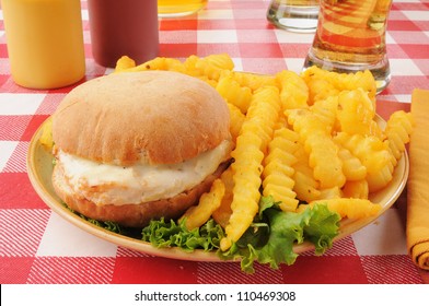 A Chicken Burger With Monterrey Jack Cheese And Beer