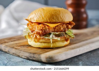 Chicken Burger With Shredded Lettuce And Cheese 