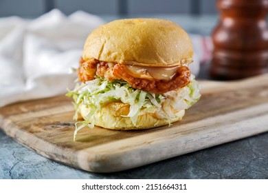 Chicken Burger With Shredded Lettuce And Cheese 