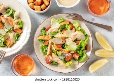 Chicken Caesar Salad, Overhead Flat Lay Shot With Wine And Lemons