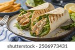 Chicken Caesar Wrap: Grilled chicken, crisp romaine, creamy Caesar dressing, and parmesan cheese wrapped in a soft tortilla for a light meal.