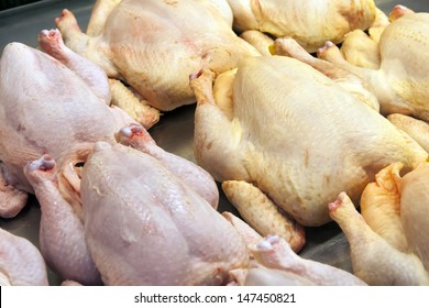 Chicken Carcasses On A Counter In Butcher Shop