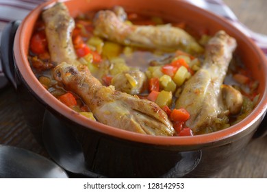 Chicken Cassoulet In A Pot On A Rustic Table