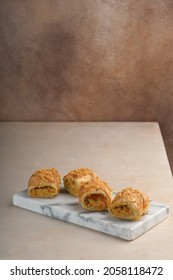 Chicken Cheese Puff Pastry On A Marble Tray.