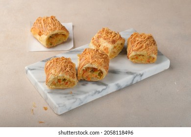 Chicken Cheese Puff Pastry On A Marble Tray.