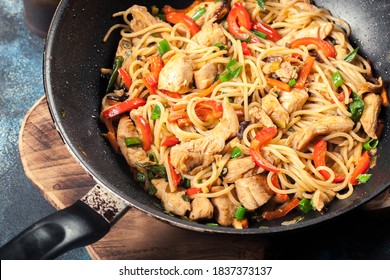 Chicken chow mein. Popular fried noodles with chicken and vegetables - Shutterstock ID 1837373137