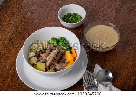 Chicken claw soup. a modern food that is favored by millennials and women because of the good properties of claws for the skin