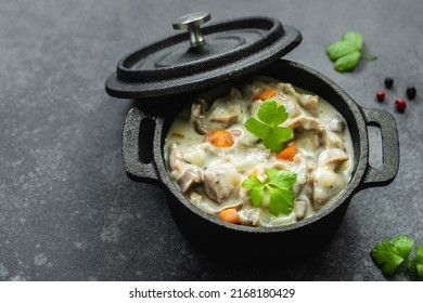 Chicken Creamy Stew In Cast Iron Pot. Top View, Copy Space.