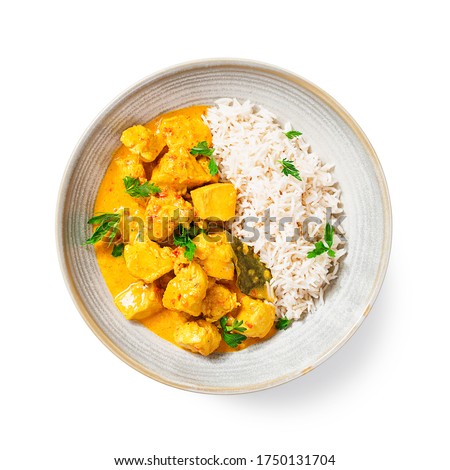Chicken curry with rice - traditional indian food isolated on white background