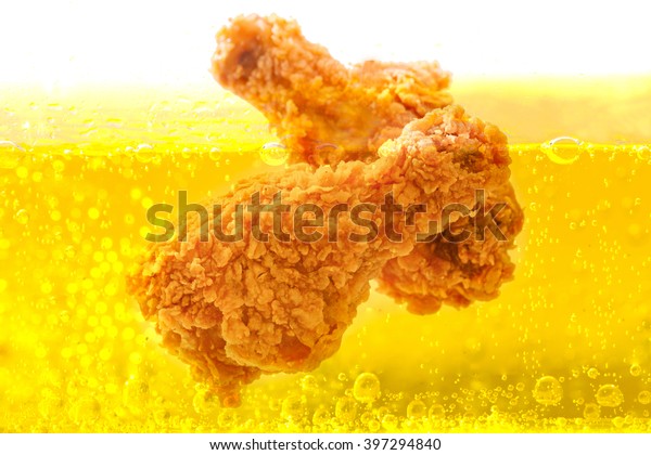 Chicken deep frying in\
oil