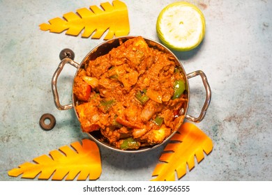 Chicken do piaza served in a karahi top view of indian food