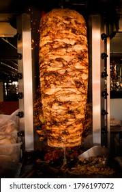 Chicken Doner Kebab. Traditional Turkish Fast Food. Delicious Chicken Kebab Turns Around The Fire.