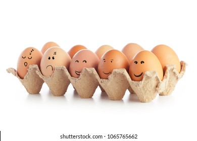 Chicken eggs with funny emoticons isolated on white background - Powered by Shutterstock