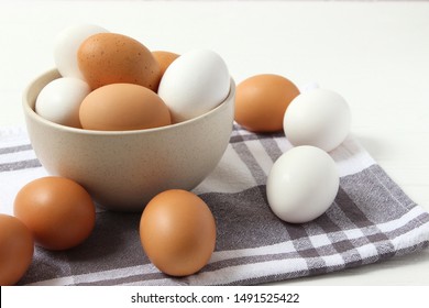 chicken eggs on the table. Farm products, natural eggs.
 - Shutterstock ID 1491525422