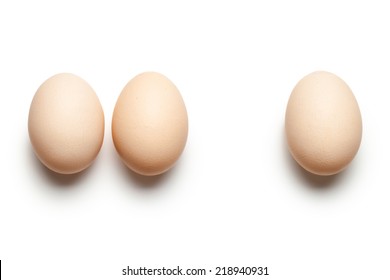 Chicken Eggs On White Background. Top View