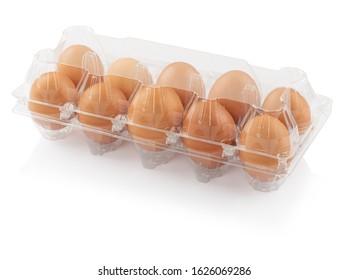 chicken eggs in a plastic container isolated on a white background, clipping path