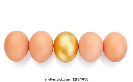 Chicken eggs in a row and in the middle a golden Easter. - Powered by Shutterstock