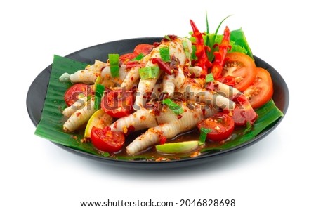 Chicken Feet Spicy Salad with Fermented Pickled fish Thai Food Zap! Style decoration Carved Chili and Vegetable sideview