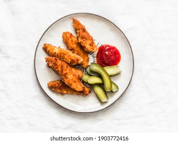 Chicken Fingers, Cornichons And Ketchup - Delicious Tapas, Appetizers, Snack On The Light Background, Top View