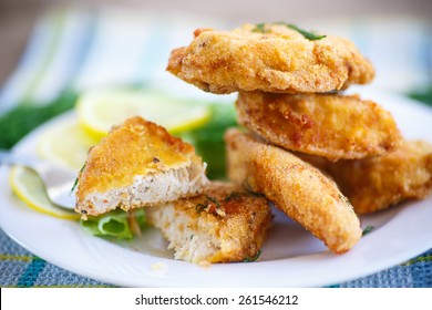 Chicken Fried In Batter With Dill On A Plate