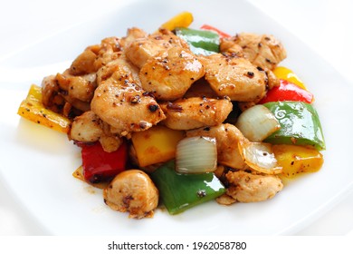 Chicken fried with black pepper and sweet pepper. - Shutterstock ID 1962058780