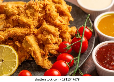 chicken, fried chicken, sauces, rustic potato, tomatos 