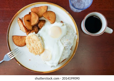 Chicken Fried Steak With Gravy, Fried Eggs And Biscuits