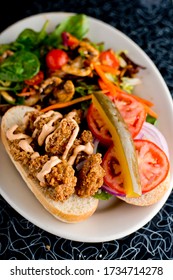 Chicken Fried Steak Sandwich Served With Fried Sun-dried And Jalapeños & Rémoulade Sauce. Classic Brunch Or Breakfast Favorite Paired With Country Biscuits, Fried Eggs And A Champagne Mimosa.