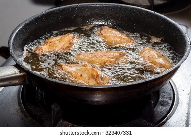 Chicken Frying In A Pan.