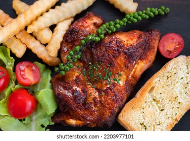 Chicken Grilled Steak With French Fries And Toast Bread. 