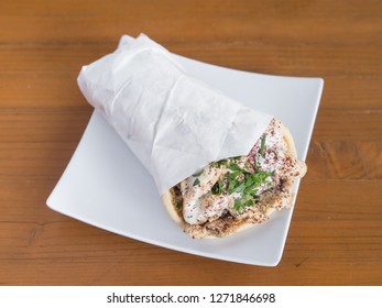 Chicken Gyro Served From A Mediterranean Food Cart In Portland, Oregon.