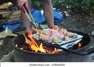 Chicken Kabobs Cooking On The Campfire