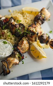 Chicken Kabobs. Cubes Of Grilled Chicken, Grilled Vegetables, Onions Bell Peppers And Seasoned With Garlic And Spices. Served With Rice, Traditional Classic Greek Or Italian Restaurant Favorite. 