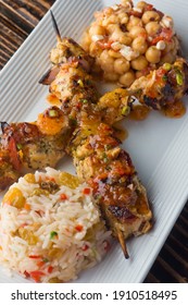 Chicken Kabobs. Cubes Of Grilled Chicken, Grilled Vegetables, Onions Bell Peppers And Seasoned With Garlic And Spices. Served With Rice, Traditional Classic Greek Or Italian Restaurant Favorite. 